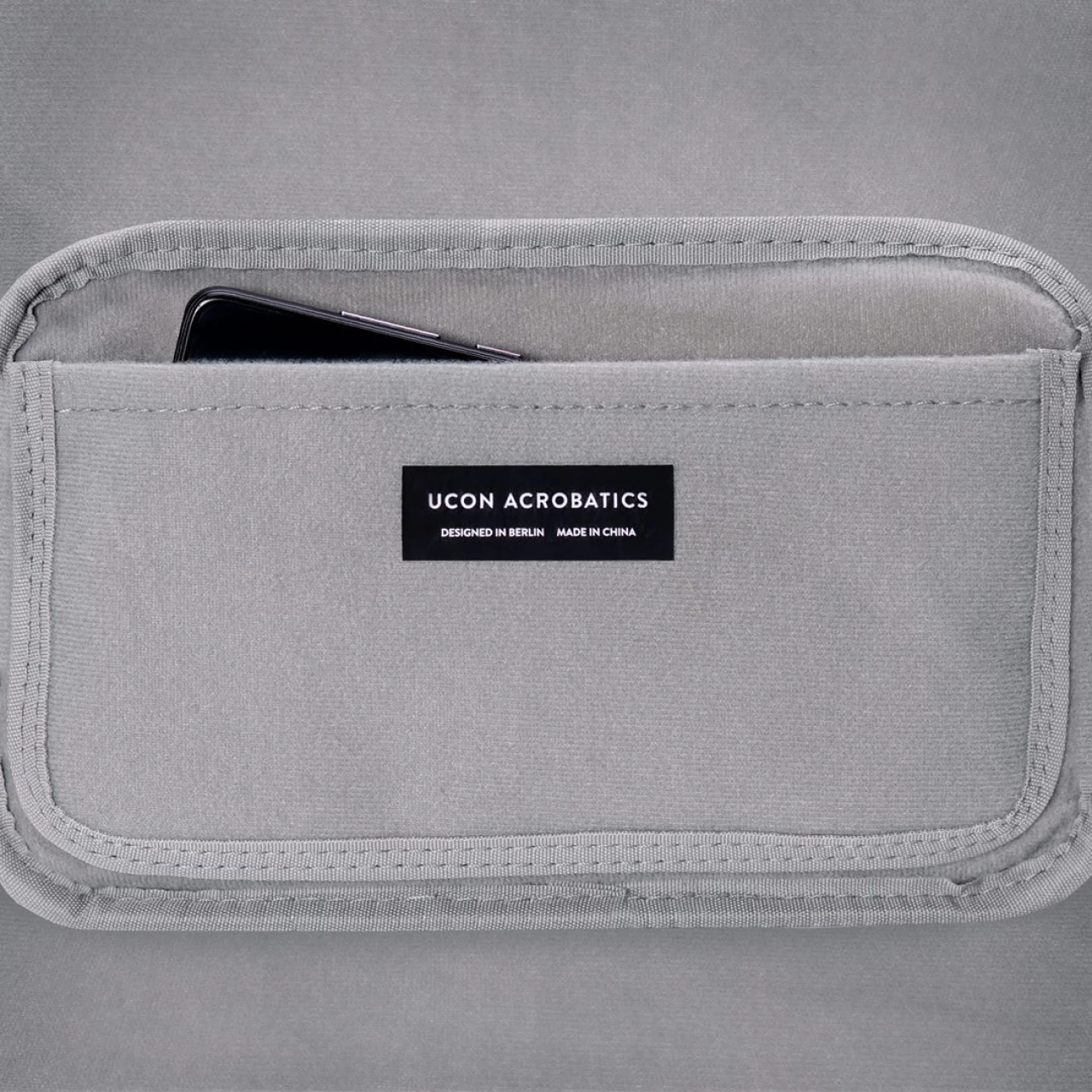 Geantă crossbody Ucon Acrobatics Jona Medium, albastru-nisip